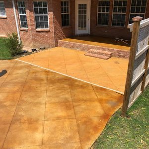 stained concrete backyard patio
