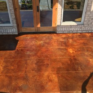 stained concrete backyard patio